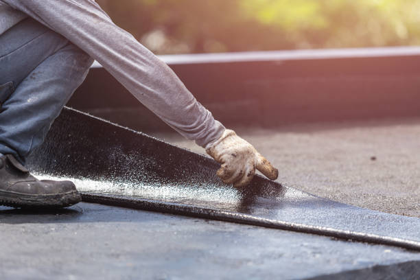 Professional Waterproofing technician working in Hampstead, NC